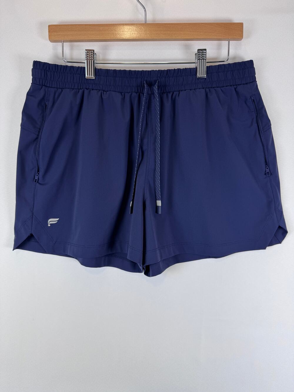 Fabletics "The One" Womens Running Shorts Size L Navy Blue Zip Pocket Athletic